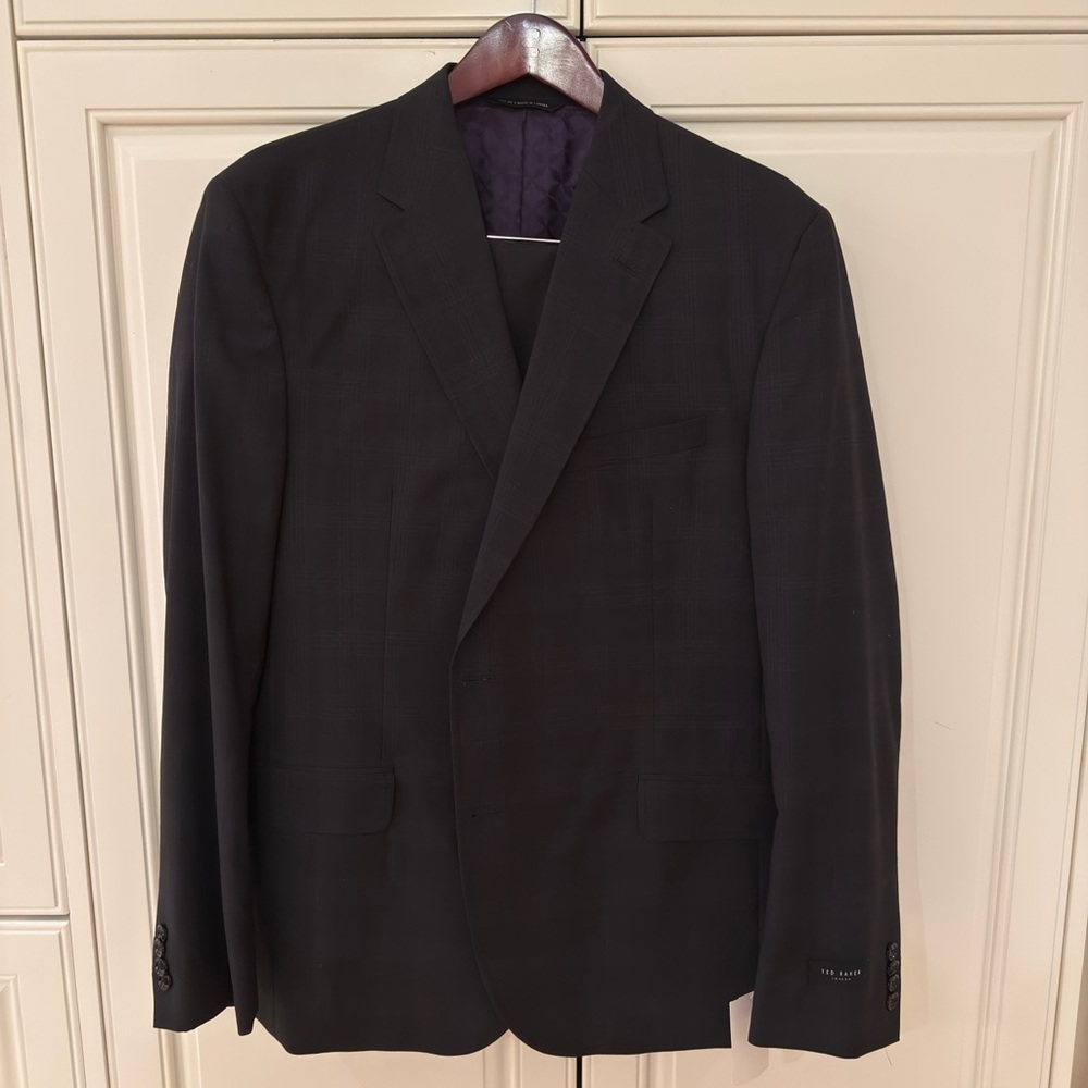Elegant dark gray/black with blue stripe suit by Ted Baker.